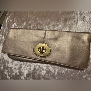 Coach gold clutch